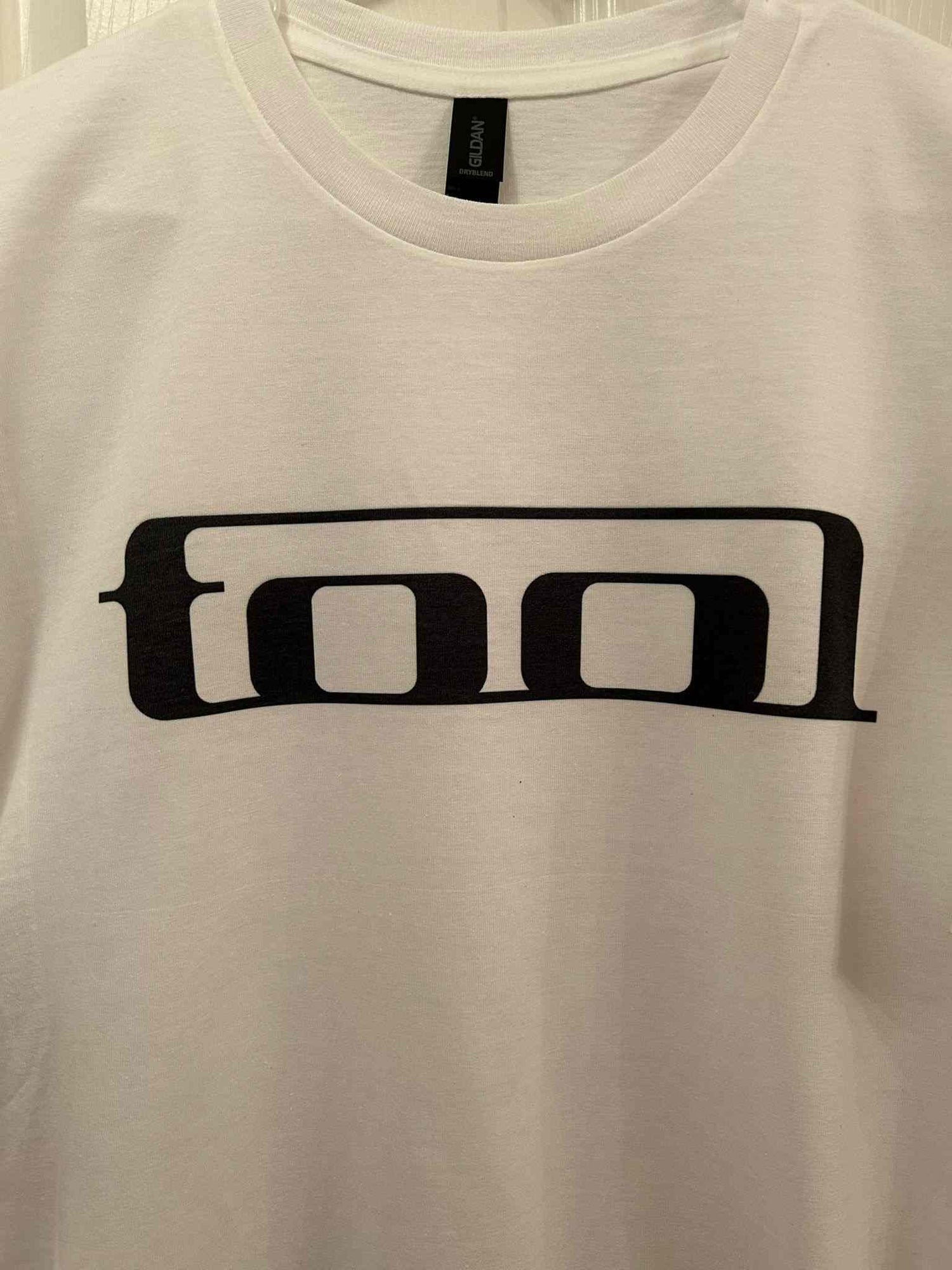 Short Sleeve T-Shirts-Custom Designing available in white fabric with black logo print.